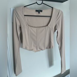 New Lulus “Flair for the Flirty Beige Ribbed Long Sleeve Bustier Crop Top”